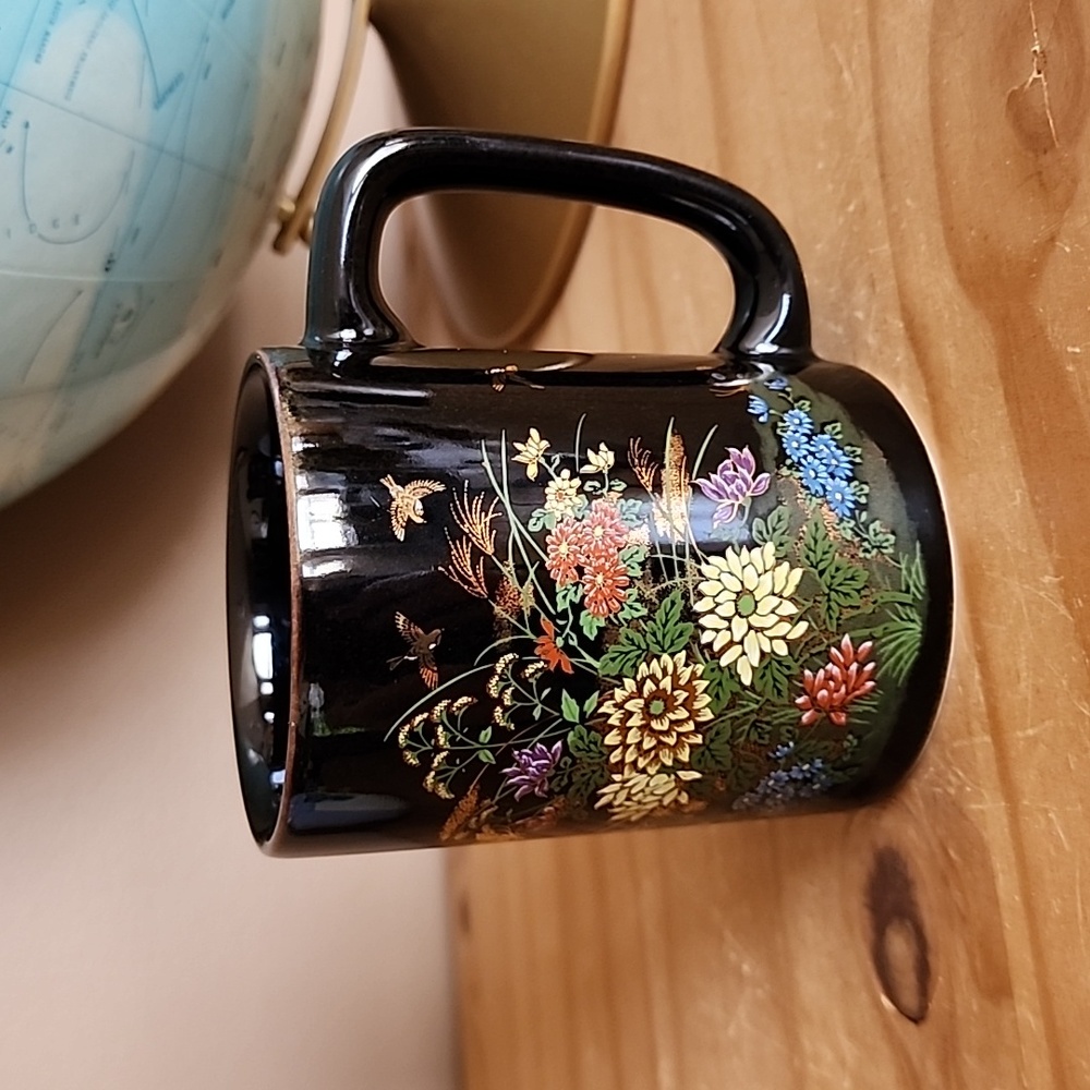 Vintage black and floral coffee mug